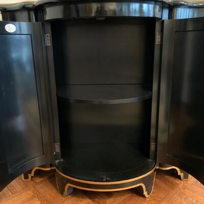 pair of black lacquer cabinets by Baker