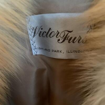 fox jacket, small tear