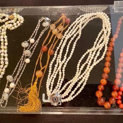 Jewelry - necklaces, bracelets, rings - pearls, carnelian, amber, semi-precious stones