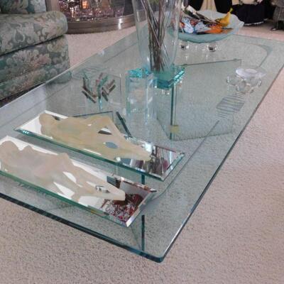 Gorgeous etched coffee table with 1/2 inch glass top. 90 degree glass supports underneath.