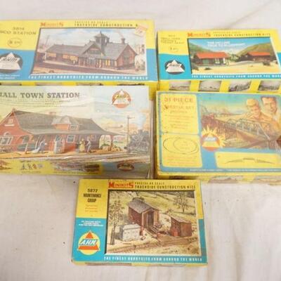 1320	LOT OF 5 AHM MINI KITS TWO OF WHICH ARE SEALED IN BOX
