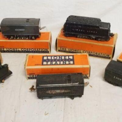 1303	LOT OF 5 LIONEL MODEL TRAIN TENDERS LOT INCLUDES NOS. 1001T, 6466WX, 2689W, 1689T 
