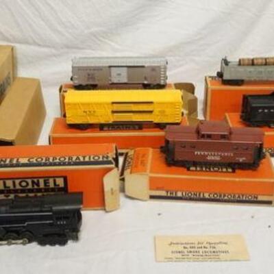 1001	LIONEL TRAINS OUTFIT NO. 2217WS O GAUGE FREIGHT TRAIN W/ WHISTLE & SMOKE TRAIN SET
