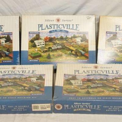 1070	5 PLASTICVILLE USA SILVER SERIES BUILDINGS, THREE OF WHICH ARE SEALED IN BOX
