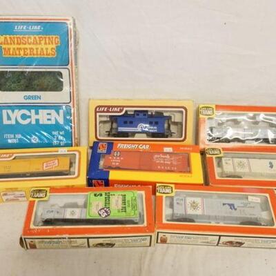 1261	LOT OF 6 LIFE LIKE HO GAUGE MODEL TRAINS PLUS LIFE LIKE LANDSCAPING MADTERIALS GREEN LYCHEN
