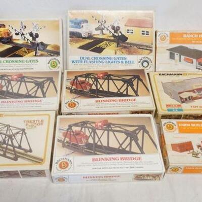 1256	9 BACHMANN MODEL BUILDING KITS, THREE OF WHICH ARE SEALED IN BOX
