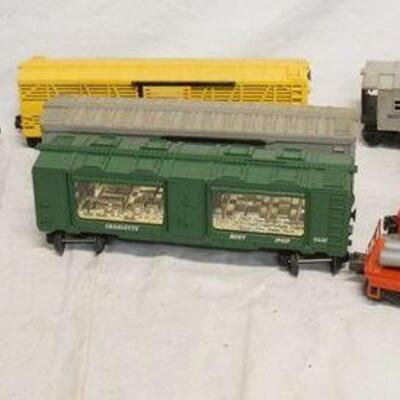 1330	LOT OF LIONEL MODEL TRAINS INCLUDES 8 TRAIN CARS & THREE CABOOSES
