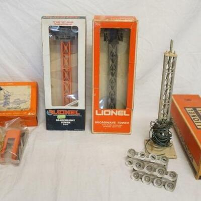 1215	LOT OF LIONEL MODEL TRAIN ACCSESORIES LOT INCLUDES HO BY LIONEL GANTRY CRANE NO. 0282, LIONEL SEARCHLIGHT TOWER 6-12716, MICROWAVE...