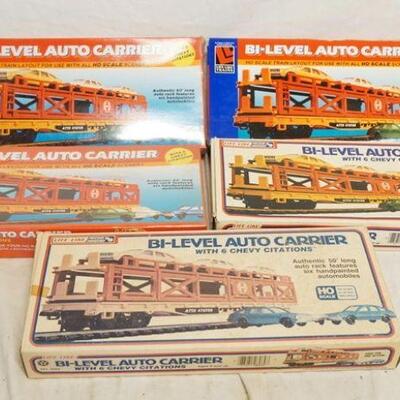1321	5 LIFE LIKE BI LEVEL AUTO CARRIER MODELS, TWO OF WHICH ARE SEALED IN BOX
