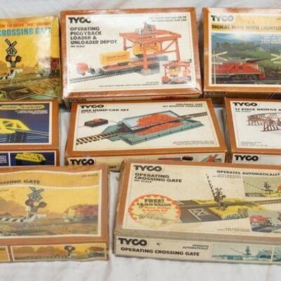 1077	8 TYCO HO GAUGE BUILDING SETS INCLUDING ONE SEALED IN BOX
