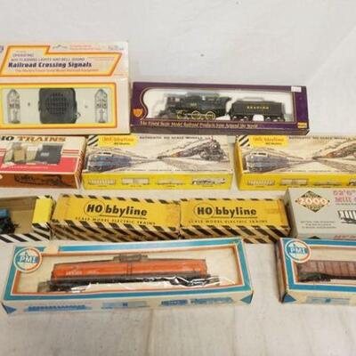 1334	MODEL TRAIN LOT HO GAUGE MODEL TRAINS, & ACCESSORIES. LOT INCLUDES PMI, HOBBYLINE, PROTO 2000 SERIES, & IHC 
