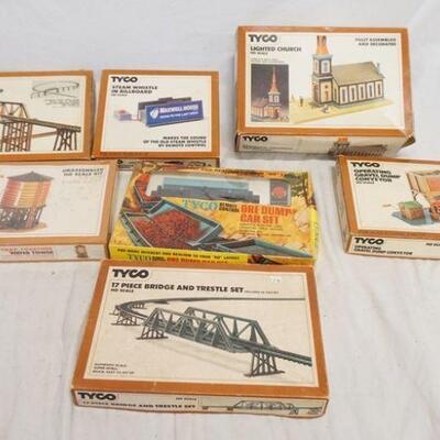 1322	7 TYCO MODEL BUILDING KITS, ONE IS SEALED IN BOX
