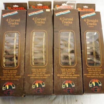 1201	LOT OF 4 LIONEL LARGE SCALE TRACKS SETS, THREE ARE CURVED TRACKS ONE IS STRAIGHT
