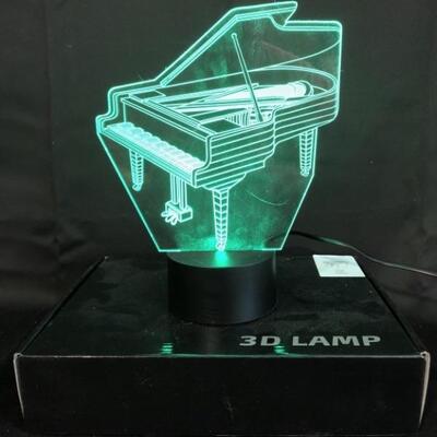 3D Color-Changing Piano Lamp is 9x7