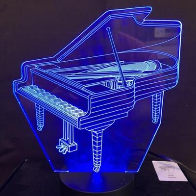 3D Color-Changing Piano Lamp is 9x7
