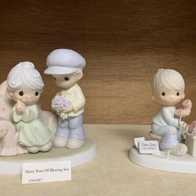 (2) Precious Moments Figurines: 1-Dear John, 
1-Many Years Of Blessing You
