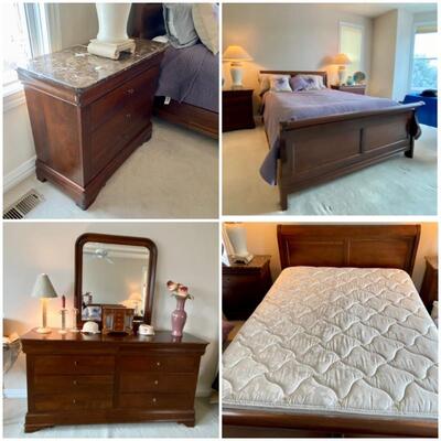Queen sleigh bed w/pillow top mattress
Nightstands, dresser and mirror also available