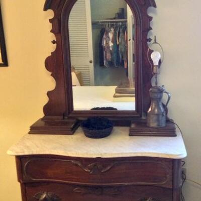 Marble topped dresser with mirror