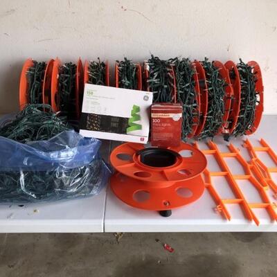 (12) Christmas Lights: 8 Reels of White Lights +
4 Net Style Christmas Lights (for bushes)