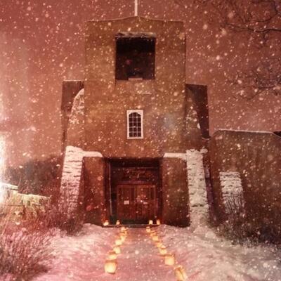 Snowy Mission Photograph, Signed by Jake Honeycutt
This photo of the San Miguel Mission in Santa Fe, NM is framed and measures 15in x 18in