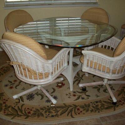 Rattan Table with Glass top and 4 Chairs on Casters