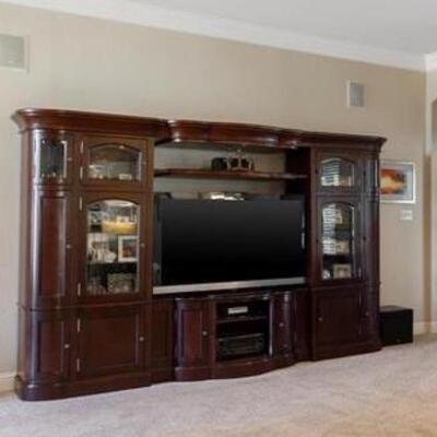 will fit up to a 80"  TV  entertainment center