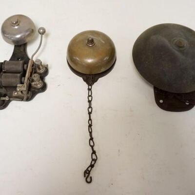 1077	LOT OF 3 ANTIQUE BELLS, 2 MECHANICAL , ONE ELECTRIC, MARKED FARADAY, LARGEST IS 8 IN LONG
