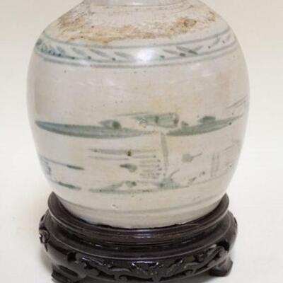 1201	BLUE & WHITE ASIAN JAR W/CARVED WOODEN BASE, 8 IN HIGH ON BASE
