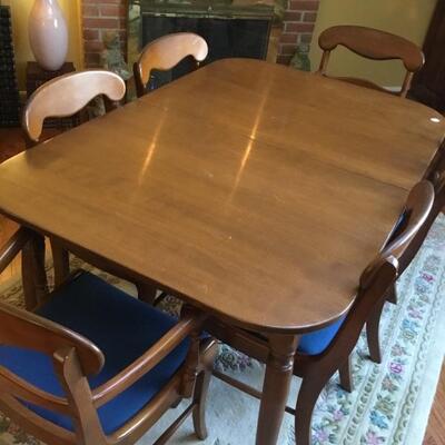 Mid century Maple table with 2 leaves, pads and 6 chairs 