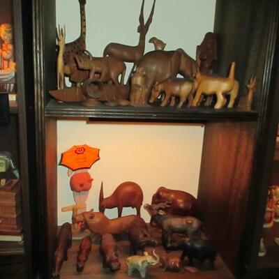 HAND CARVED ANIMAL STATUES  