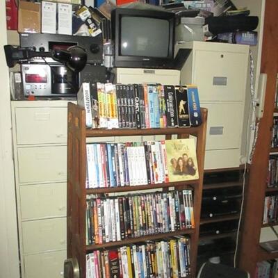 MASSIVE COLLECTION OF DVD'S , FILE CABINETS AND MORE 