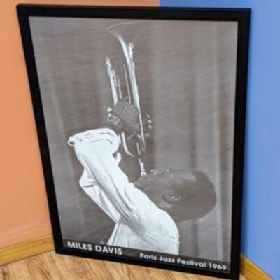 Framed Miles Davis Print. Measures 25.5” x 36”.