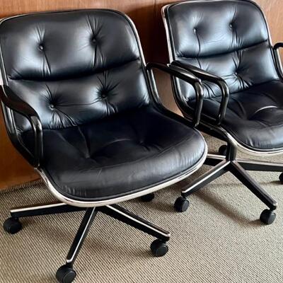 Pair of Vintage Leather Knoll Executive Chairs. Sleek design with black upholstery accented with chrome base. Both chairs in good...