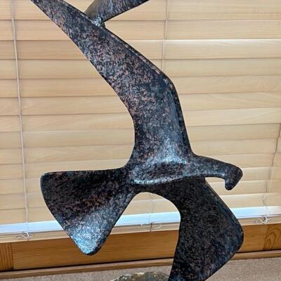 Amazing Bird Sculpture Set on a Quartz Rock measuring 5' tall with the rock base measuring 16