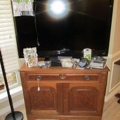 47" VIZIO TV & ANTIQUE BUFFET ON CASTORS.