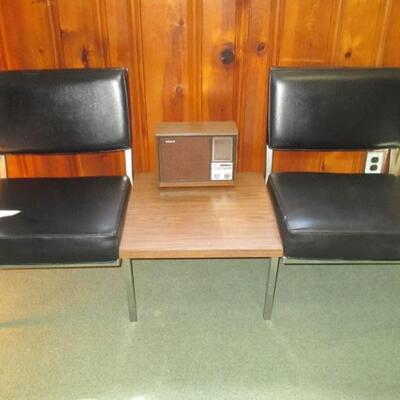 Mid Century ECK-ADAMS metal & vinyl industrial Waiting Room Chairs Connected By Side TableDated: c1970, Color is black vinyl