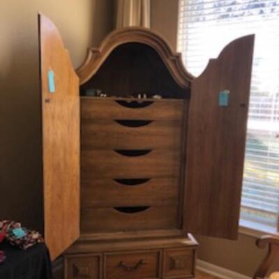 Inside the "armoire" is a dresser