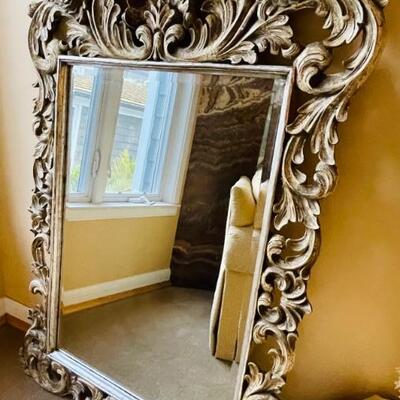 Ornate silver mirror
