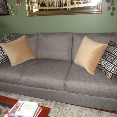 Couch with matching loveseat and chair/ottoman.  Looks brand new!