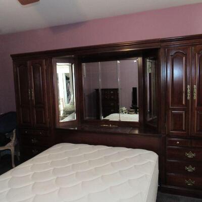 Queen bed with surround armoire