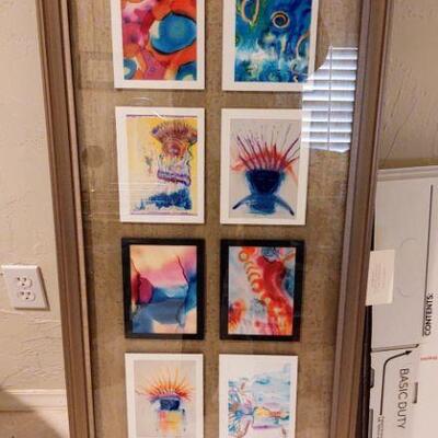 Drue Ridley framed postcards.  18.5 X 46 inches.  Auction Item