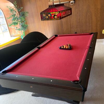Pool Table - Pool Cues  and Holder, triangle and Balls Included.      
 Pool Light Sold Separately .         