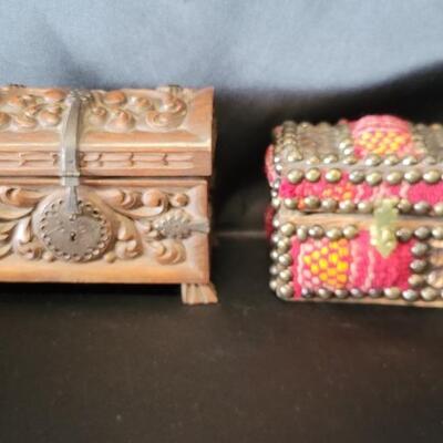 (2) Wooden Trinket Boxes: 1-Ornately Carved, +
1-Covered with Cloth & Flower Design & a Copper Overlay with Brads