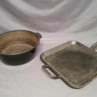(2) Cast Iron Cookware: 1-Griddle & 1-Lodge Pot