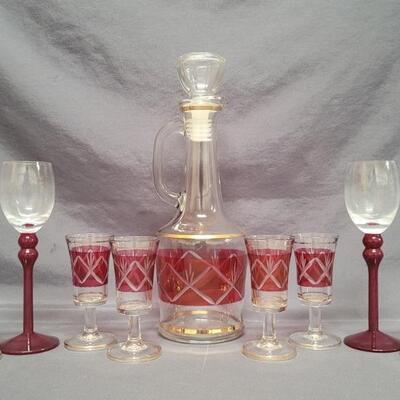 Vintage Decanter Ruby Cut to Clear Decanter Set:
Decanter with Stopper + 6 Cordials
BONUS - 2 Ruby Red Stem Wine Glass that are not part...