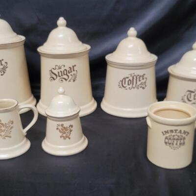 (7) Pfaltzgraff Village:Creamer & Lidded Sugar, 
4-Lidded Canisters & 1-Canister with no lid