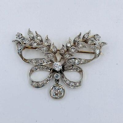 Antique platinum & 18k diamond brooch with .90ct solitaire
