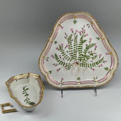 "Lot of 2. 1) Triangular serving dish with decoration of pink blossoms and leaves. Three wave blue mark; one nick at edge. Size: 8...