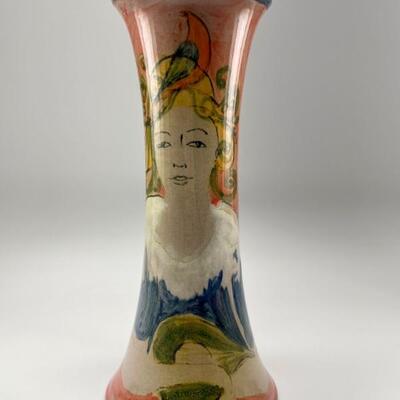 "Florence & Pierre Scheyvaerts workshop (France). Earthenware flower vase depicting a girl with stylized hat and garment at...