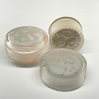 "Lot of three: 1) R. Lalique for Maison Lalique "Meudon" circular powder box with base, circa 1924. Marked: R. Lalique in...